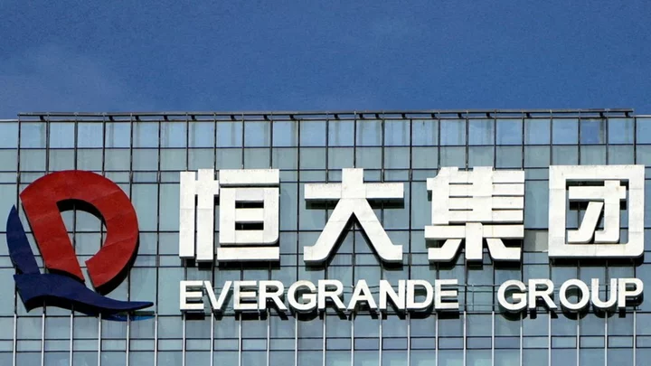 Evergrande shares slide as mainland unit misses debt payment