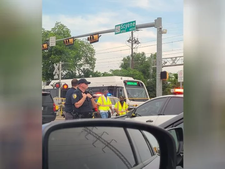 Authorities search for suspect after shooting on a DART train in Dallas leaves 1 dead and 2 others injured