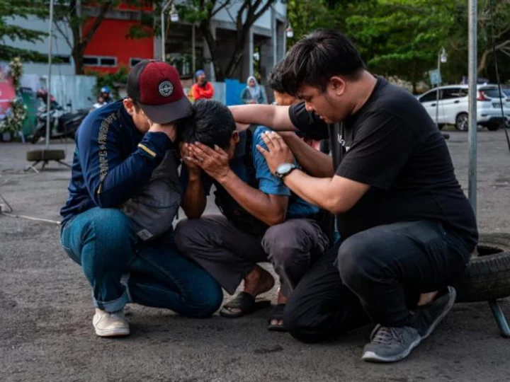 One year on from stadium disaster that killed 135, these families are still seeking answers