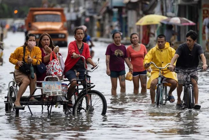 Typhoon Doksuri destroys power lines, closes factories as it rips into China