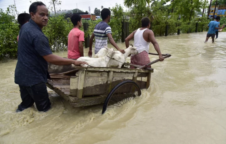 Flooding displaces tens of thousands and kills 1 as heavy monsoon rains batter Indian villages