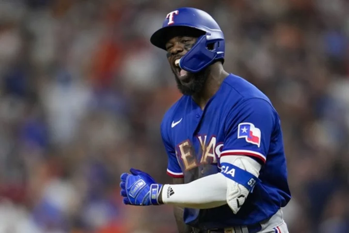 García powers Rangers to first World Series since 2011 with 11-4 rout of Astros in Game 7 of ALCS