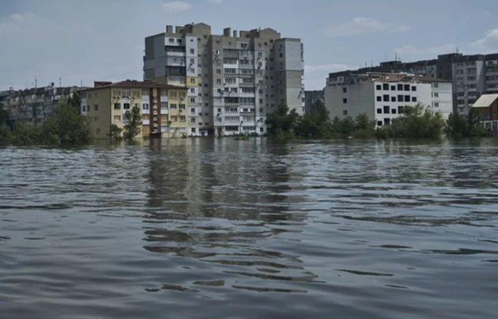 A dam collapses and thousands face the deluge — often with no help — in Russian-occupied Ukraine