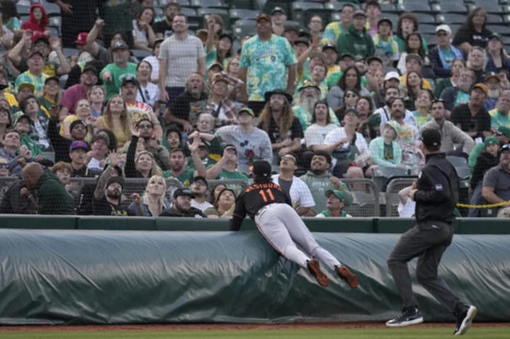 Henderson hits 2-run homer, RBI single as Orioles top A's 9-4