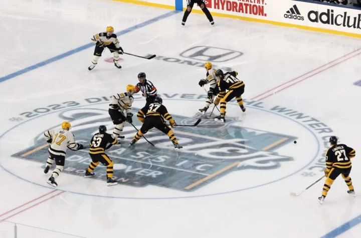 How many hockey players are on the ice at once?