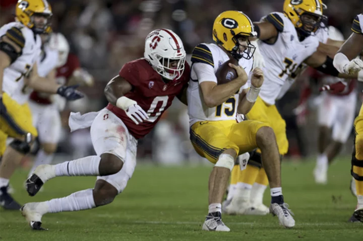 Mendoza hurt, returns to lead Cal past Stanford 27-15 in Big Game