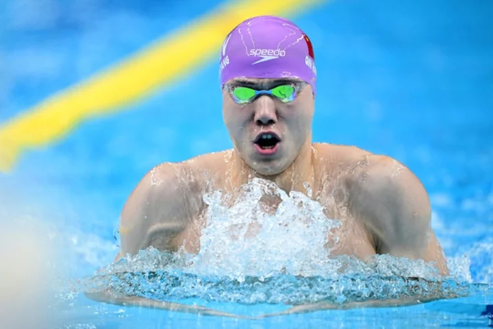 China in control as backstroke king Qin sets new Asian Games mark