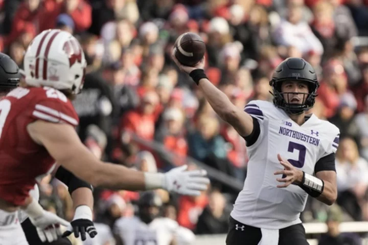 Bryant returns from injury and sparks Northwestern to 24-10 victory at Wisconsin