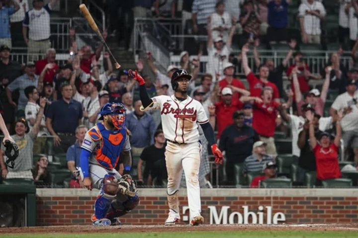 Albies hits 3-run homer in 10th, Braves rally to beat reeling Mets 13-10 for 3-game sweep