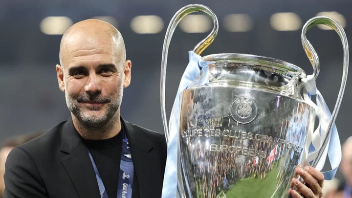 Pep Guardiola sets managerial history with Man City treble