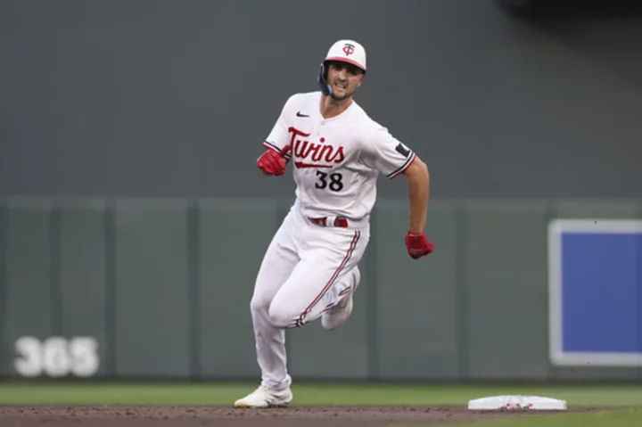 Twins use big innings early, late to rout Rangers, 12-2