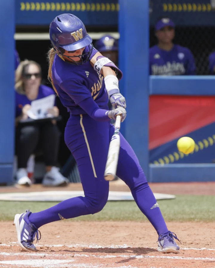 Holtorf's three hits lead Washington past Utah in Women's College World Series