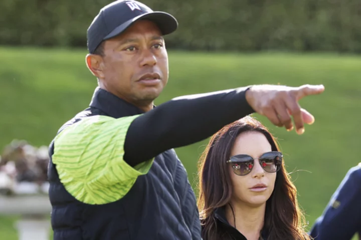 Ex-girlfriend: Tiger Woods used lawyer to break up with me