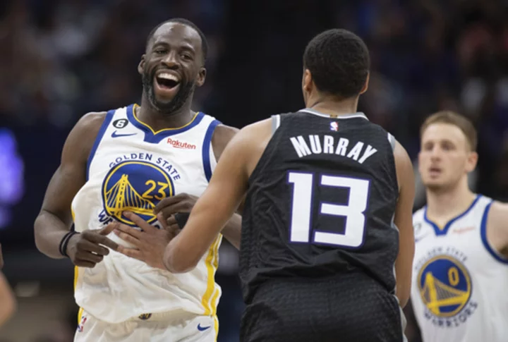 Draymond Green staying with Warriors on a new 4-year deal, source tells AP