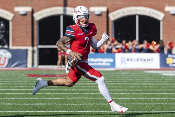 No. 25 Liberty stays unbeaten after Kaidon Salter accounts for 4 touchdowns in 49-25 win over UMass