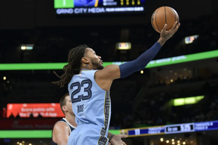 Nikola Jokic, Jamal Murray lead Denver past Memphis 108-104