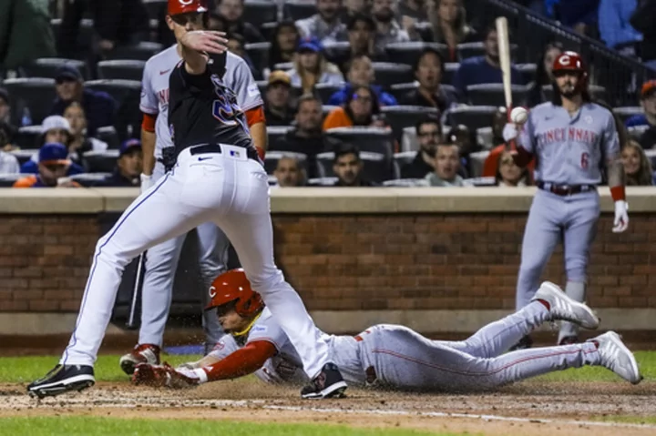 India homers in 7th to help Reds beat Mets 5-3, keep pace in wild-card race