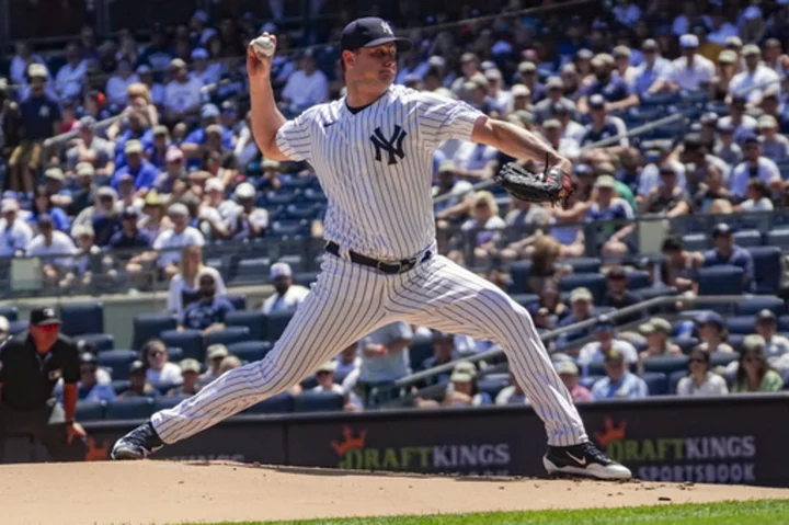 LeMahieu and Stanton homer as Yankees beat Royals 5-2. Cole strikes out 10