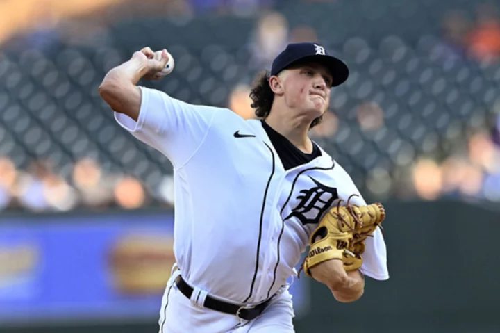 Andy Ibañez homers twice in the Tigers' 8-6 victory over the Cubs