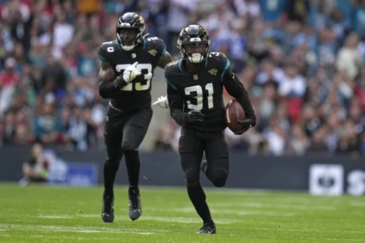 Lawrence, Ridley and defense help Jaguars beat Falcons 23-7 in London