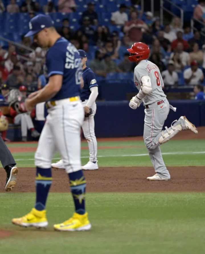 Walker wins 6th straight start, Phillies beat Rays 8-4 for 11th consecutive road win