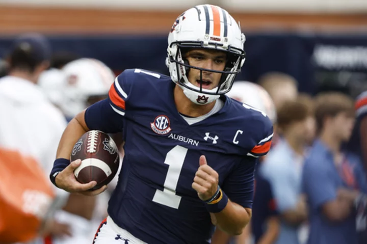 Thorne runs, passes Auburn to 45-13 victory over Samford