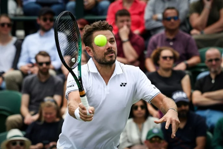 Wawrinka hopes to 'not get killed' by Djokovic at Wimbledon