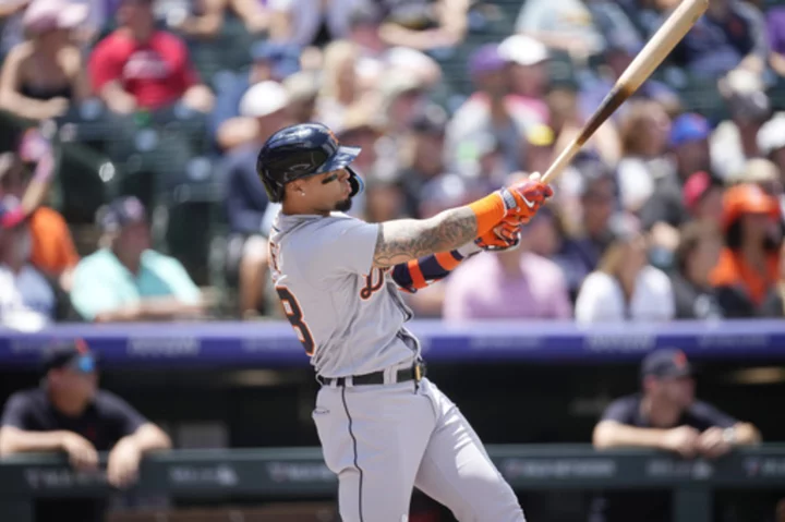 Baez, Marisnick hit grand slams, Tigers go deep 5 times to beat Rockies 14-9