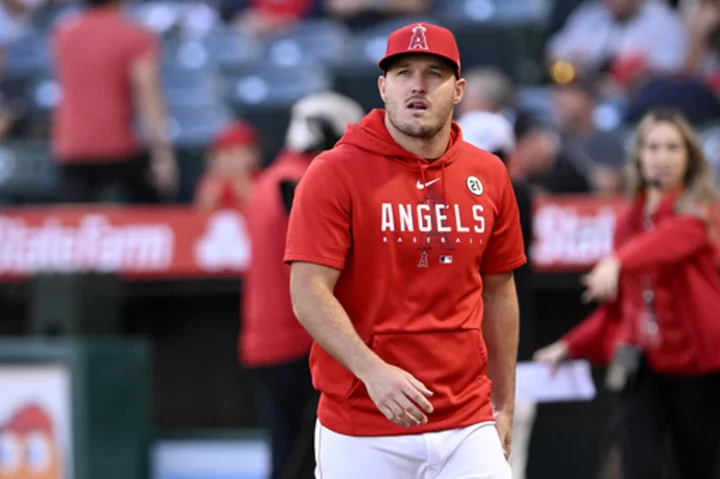 Injured Angels star Mike Trout accompanies team on final road trip of season, takes dry swings