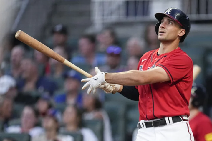 Olson homers twice and NL-leading Braves go deep six times in a 16-4 rout of the Marlins