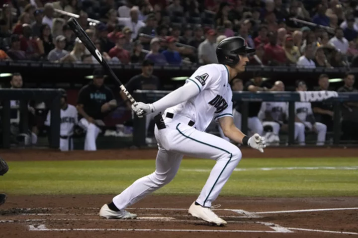 Carroll drives in winning run in the 10th in the Diamondbacks' 3-2 victory over the Pirates