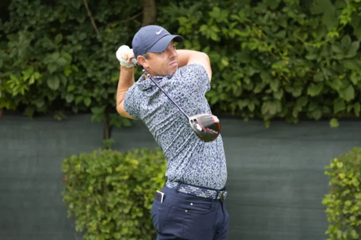 McIlroy, Harman share BMW Championship lead on a soft Olympia Fields