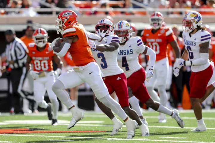 Gordon gains more than 100 yards rushing, receiving; Oklahoma State tops No. 23 Kansas 39-32