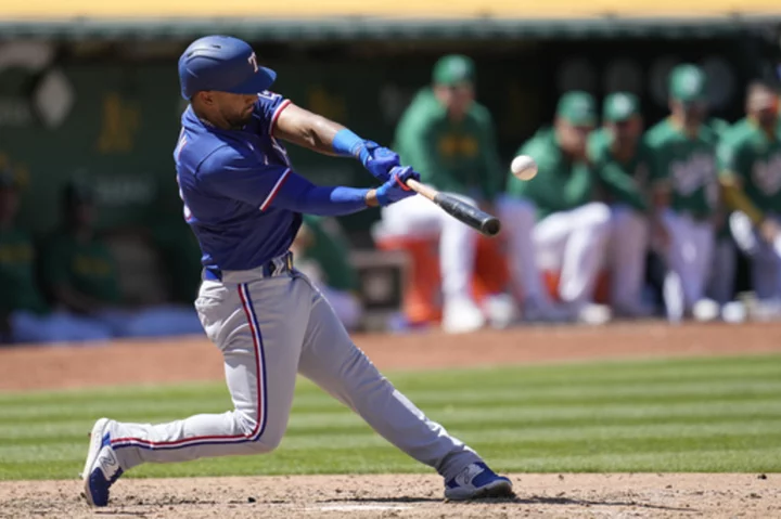 Gray pitches 8 scoreless innings, Rangers beat A's 5-0