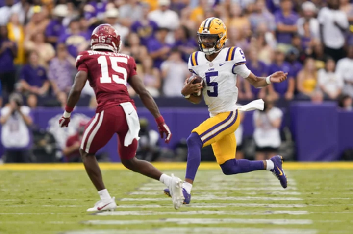 Daniels' 4 TD passes, Ramos' late kick lift No. 12 LSU over Arkansas, 34-31