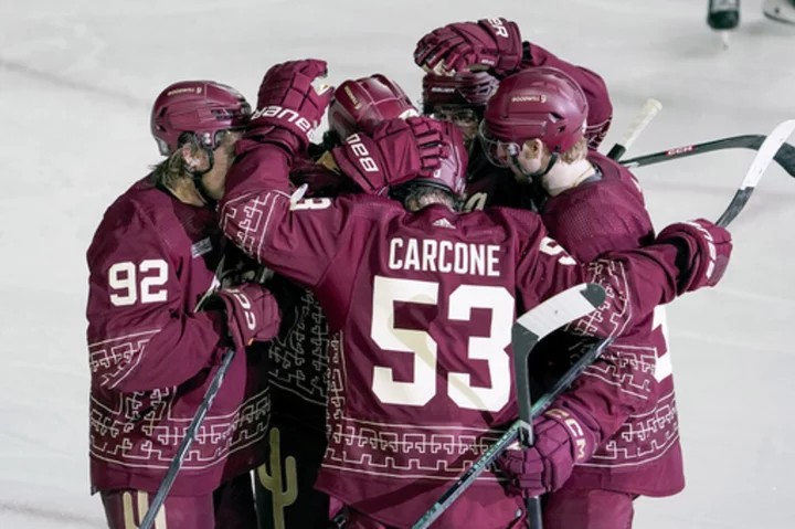 Michael Carcone scores 3 times as Arizona Coyotes pound Chicago Blackhawks 8-1