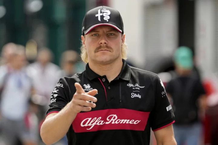 Valtteri Bottas and Zhou Guanyu will stay in Formula 1 next season with rebranded Alfa Romeo team