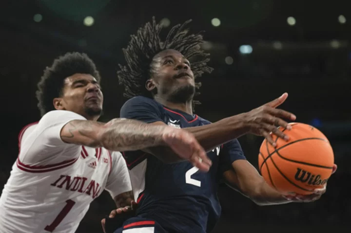 Newton helps No. 5 UConn pull away from Indiana in 77-57 victory in Empire Classic