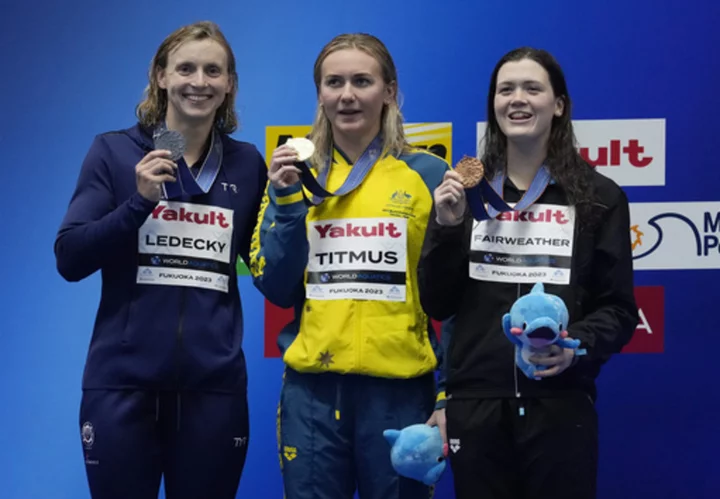 Australian Titmus takes it out fast and sets WR in 400m freestyle as Ledecky settles for silver