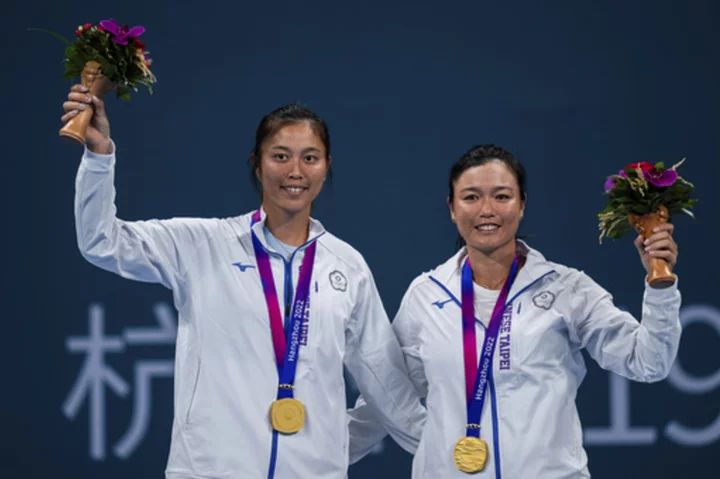 Taiwanese sisters take gold in women's doubles tennis at the Asian Games