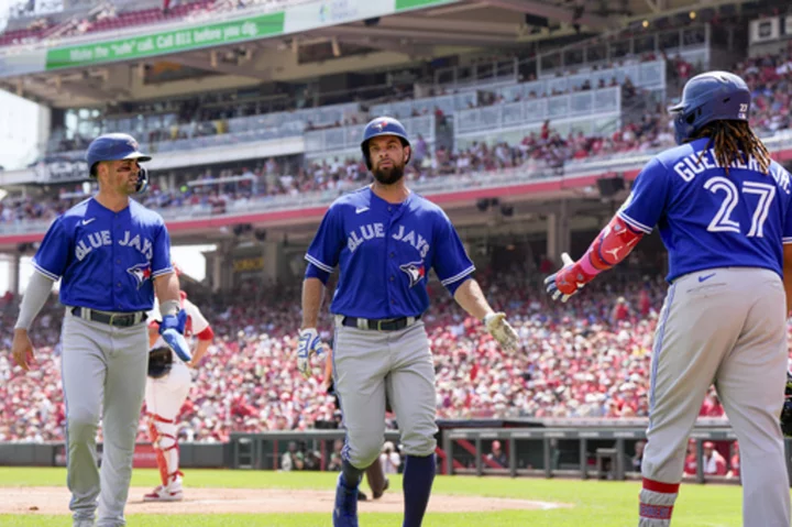 Belt hits 2 of Blue Jays' 5 home runs off Hunter Greene in 10-3 rout of Reds