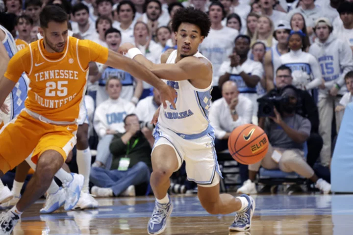 No. 17 UNC builds big lead then holds off No. 10 Tennessee 100-92 in ACC/SEC Challenge