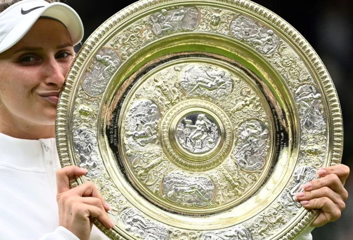 Unseeded Vondrousova stuns tearful Jabeur to win Wimbledon title