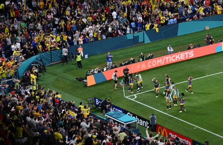 Soccer-Passionate Colombia fans set standard at Women's World Cup