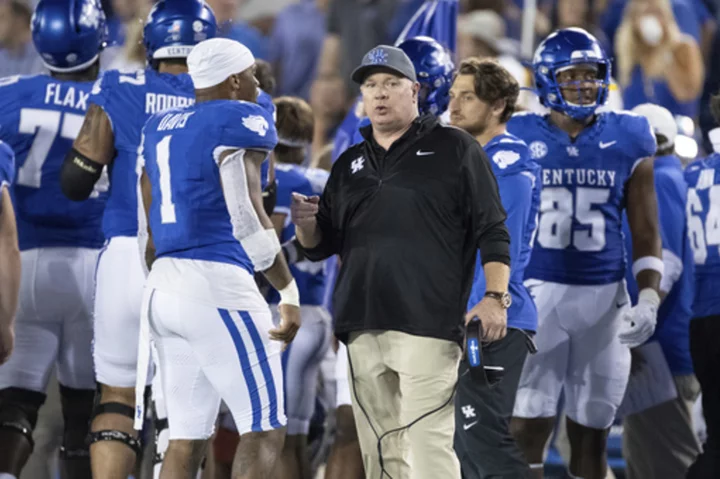 Kentucky's Mark Stoops clarifies 'pony up' remark regarding donations for NIL. He loves the fan base