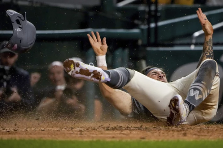 Chavis scores on Varland's 11th-inning wild pitch as Nats beat Dodgers 7-6 after 4-hour delay