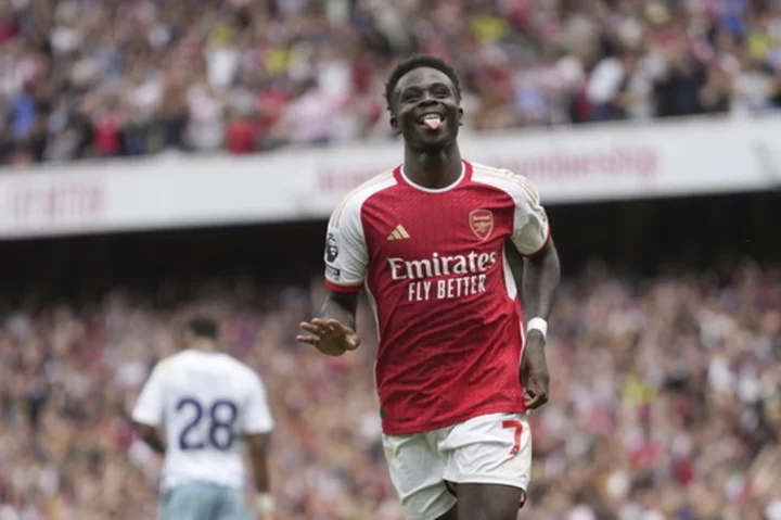 Saka sparkles as Arsenal opens EPL season with win. Brighton routs newcomer Luton