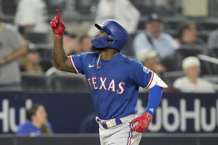 García's 2-run homer in the 10th lifts the Rangers over the struggling Yankees 4-2