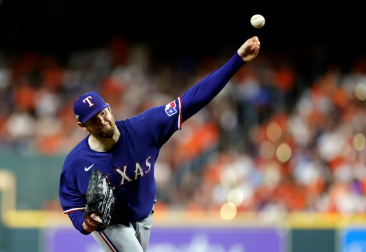 Rangers blank defending champion Astros in MLB playoffs