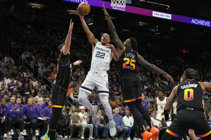 Booker returns with 34 points, Suns top Grizzlies 116-109